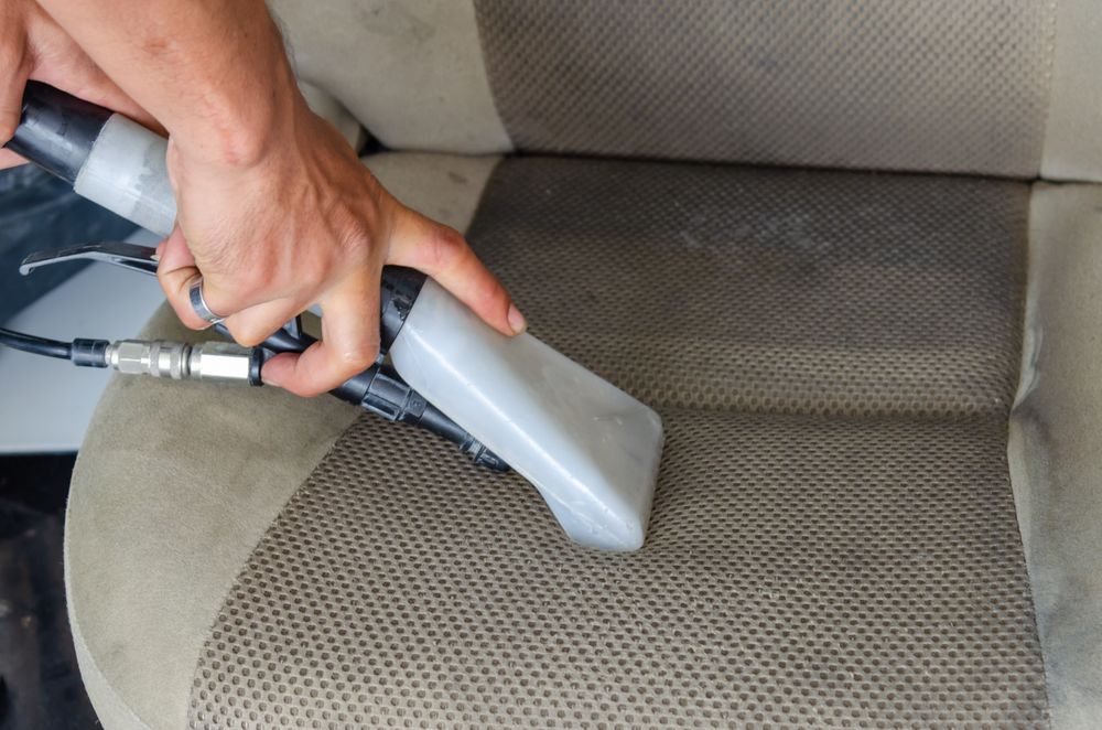 Steam cleaning equipment used for interior detailing